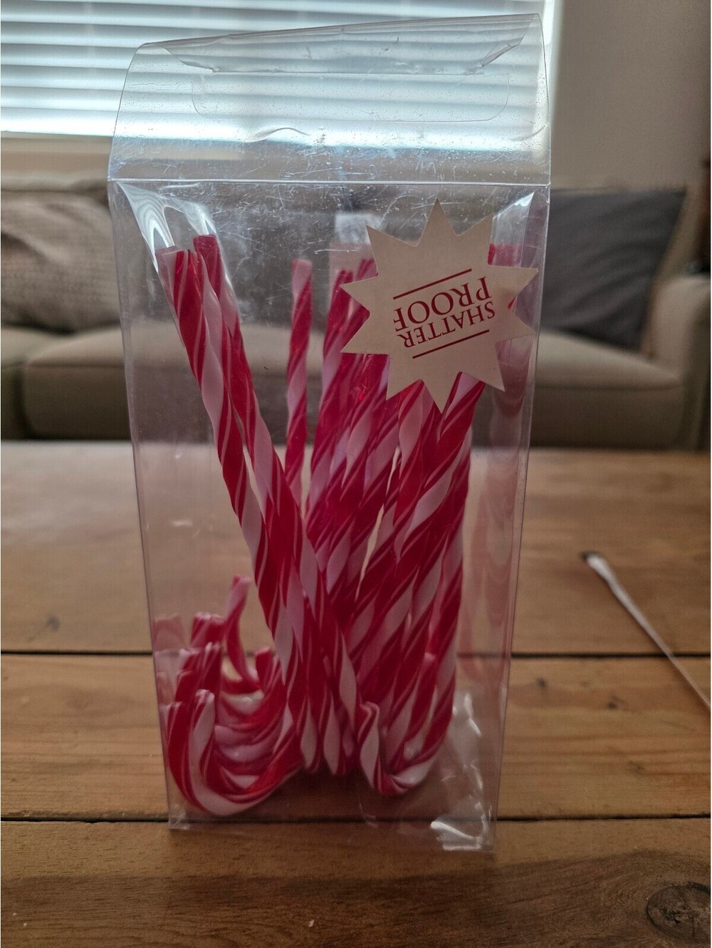 Red and White Candy Canes in Clear Plastic Box